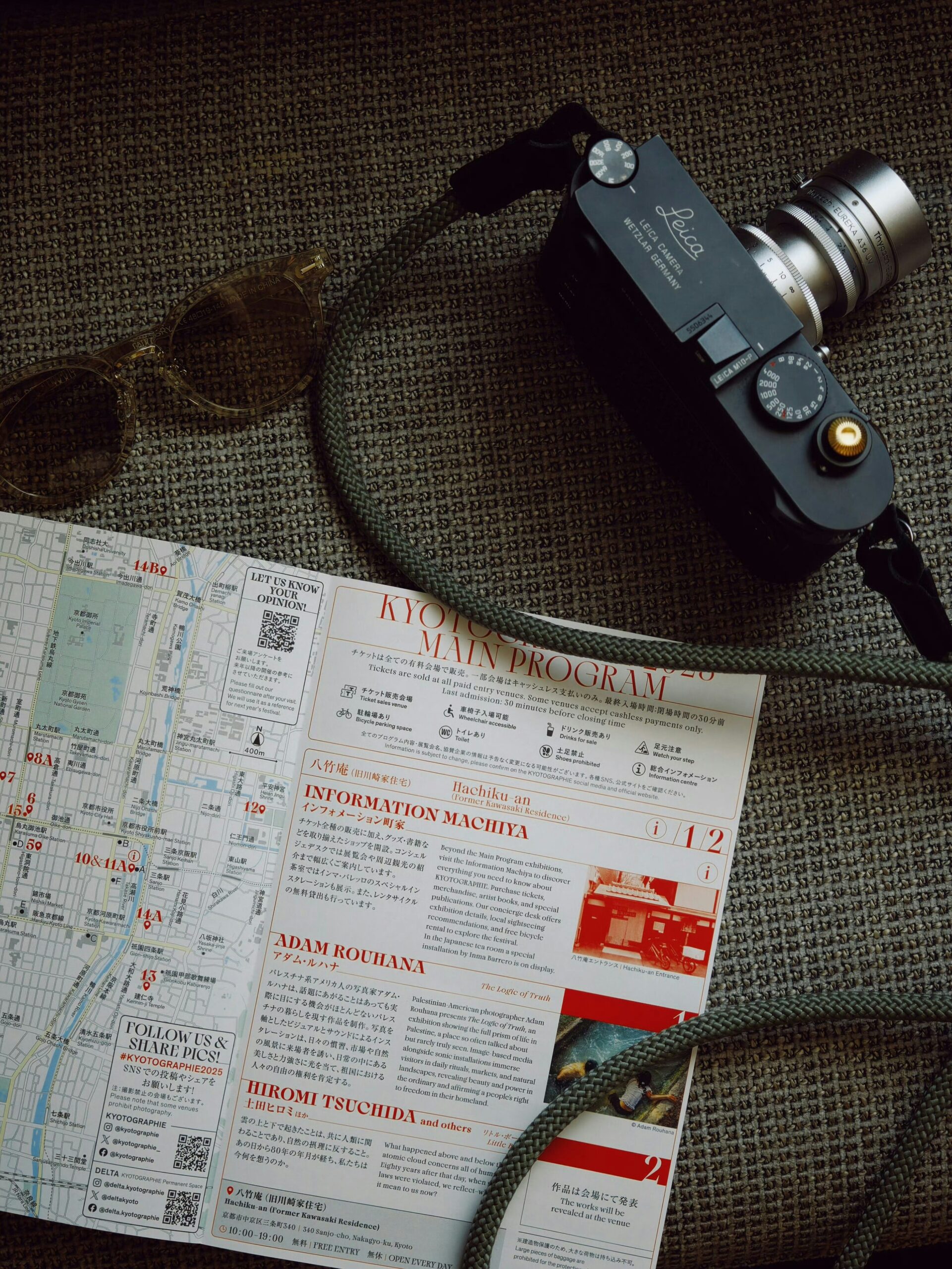 KAN-NOTE-01 · paper map, coffee, notebook, train ticket on a table — 3:4, 1100×1466