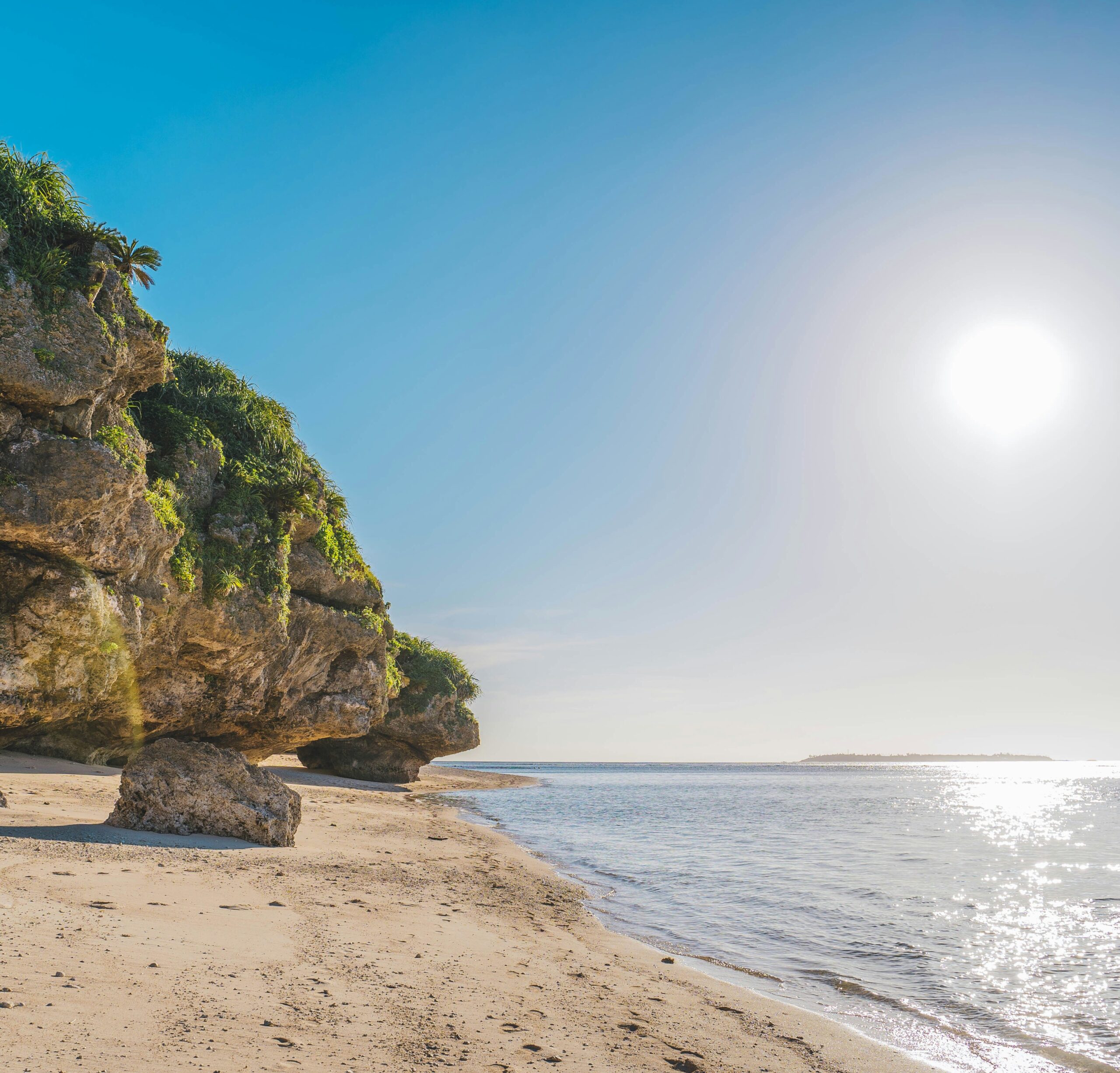 OKI-DAY-04 · a quiet unnamed beach, shoes left behind, nobody else around. 1:1, 1200×1200