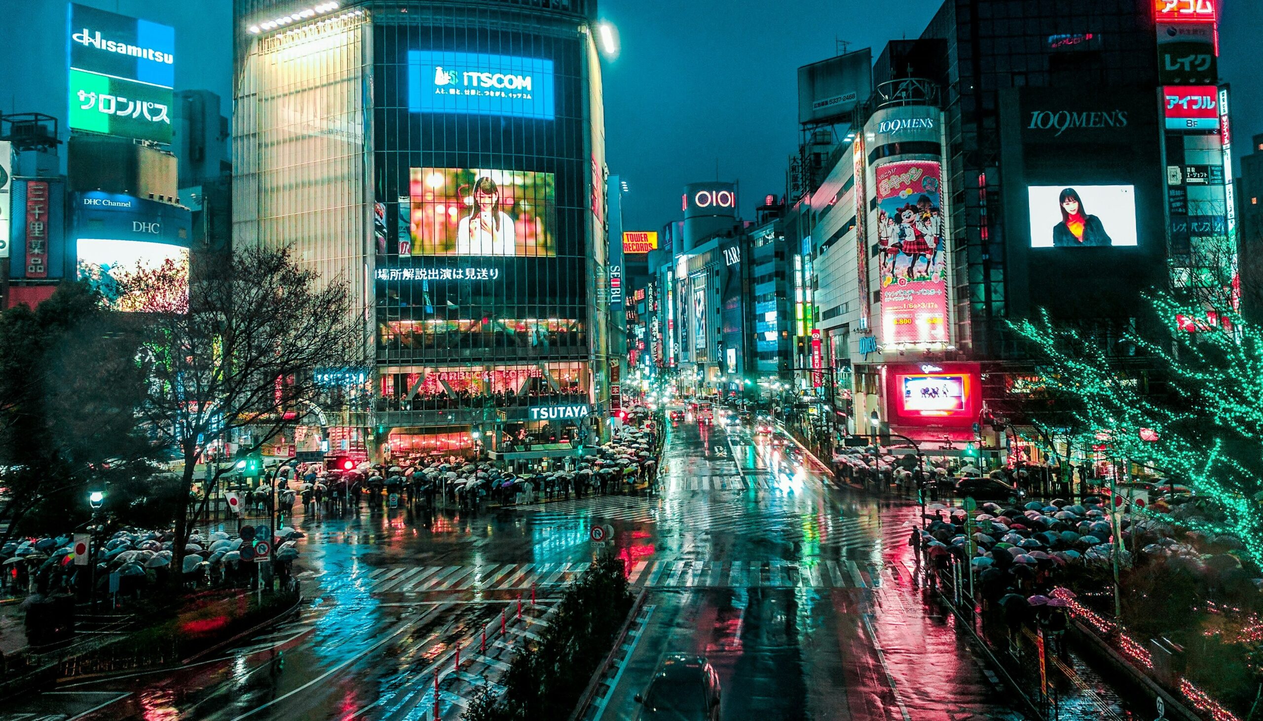 TOK-NIGHT-01 · neon-lit street, wet asphalt reflections — 16:9, 1920×1080